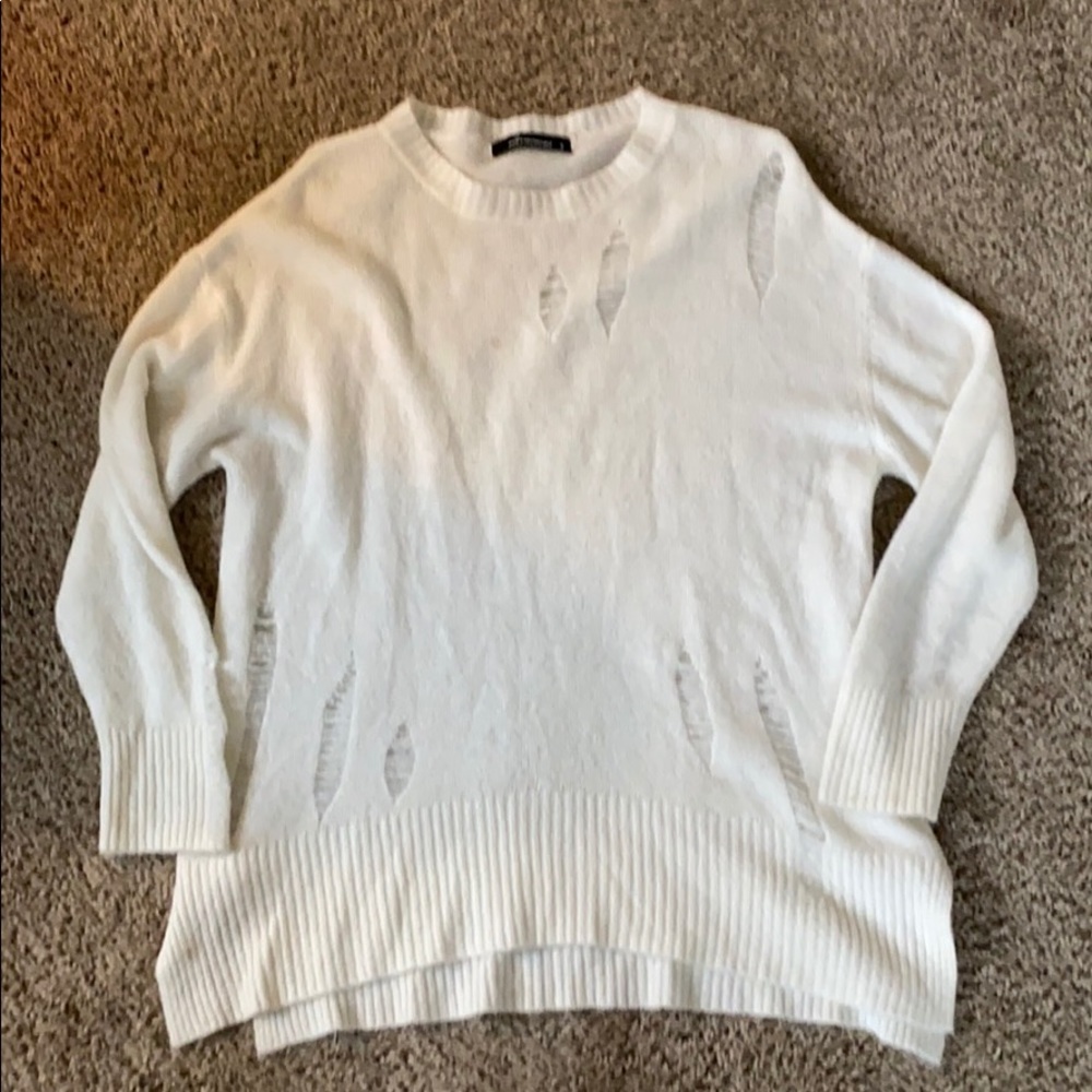 Sweater with rips